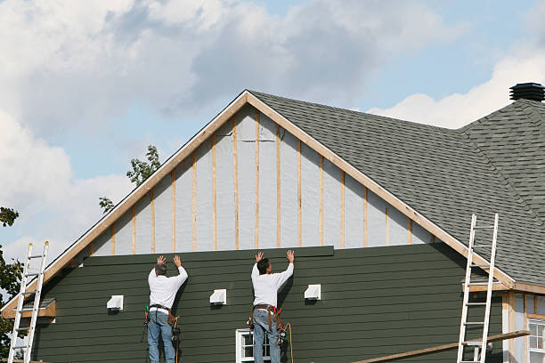 Professional Storm Damage Siding Repair technician working in Alliance, NC